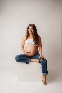 Editorial Studio Maternity Photoshoot - Pregnant mother poses for Editorial Studio Maternity Portraits at Holy City Babies in Charleston, SC.