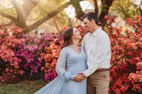 Maternity Photos in Charleston, SC -- Expectant mother poses for Maternity Portraits at Hampton Park in downtown Charleston, SC.