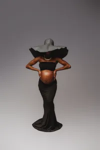 Pregnant woman poses for studio Maternity Portraits at Holy City Babies Portrait Studio in Charleston, SC.