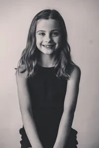Young girl smiles at the camera during Personality Portrait Photoshoot in Charleston, SC.