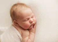 Newborn posed for Baby Photos in Charleston, SC.