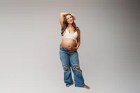 Expectant mother poses for Studio Maternity Portraits at Holy City Babies Portrait Studio in Charleston, SC.