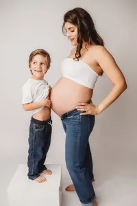 Editorial Studio Maternity Photoshoot - Pregnant mother poses for Editorial Studio Maternity Portraits at Holy City Babies in Charleston, SC.