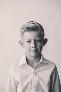 Young boy peers at the camera during Personality Pictures in Charleston.