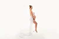 Expectant Mother poses for Studio Maternity Portraits in Charleston, South Carolina.
