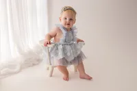 Baby celebrates her first birthday with Cake Smash Pictures at Holy City Babies Portrait Studio in Charleston, SC.