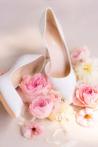 bride shoes with flowers flat lay at rainbow oaks ranch in sanger california