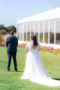 fairview metropolitan in oakland wedding first look bride and groom on golf course