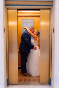 bride and groom in san francisco city hall elevator