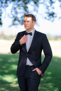 groom portrait under tree at rainbow oaks ranch in sanger california