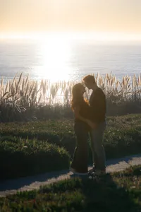 couple embracing in sunset sparkle ocean at seascape resort in aptos california