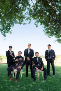 editorial groomsmen photo under tree at rainbow oaks ranch in sanger california