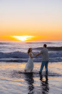 couple dancing in ocean in santa cruz california