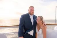 san francisco wedding cruise bride and groom smiling on deck