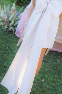 bride bow dress reception at rainbow oaks ranch in sanger california.
