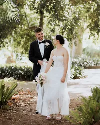 Guests dancing, laughing, and celebrating captured in stunning wedding photography by JakeyVass Media.