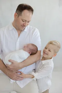 Father and sons candid picture by Suzanne Karp Photography in San Anselmo California