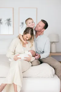 Indoor candid and documentary photo session for a family at their house with a newborn by Suzanne Karp Photography