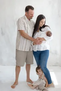 Family welcome newborn into the family by taking a full family studio photo session by Suzanne Karp Photography in the Napa Valley California