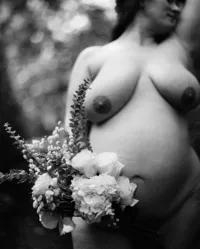 Woman photographed on medium-format film during an outdoor Goddess boudoir session near Durham, NC.