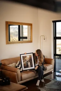 Lightkeeper Photography Photographer Katherine looking at Framed Print