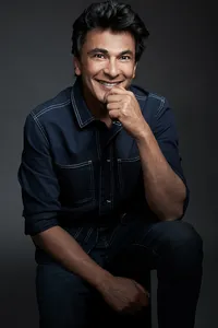 Vikas in a professional studio portrait, exuding confidence and approachability, shot by Ylva Erevall.