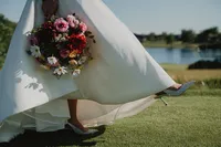 bride-shoes-flowers-water