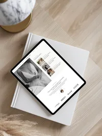 iPad on a table showing an elegant showit website template