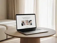Laptop on table showing a wedding photography pricing guide