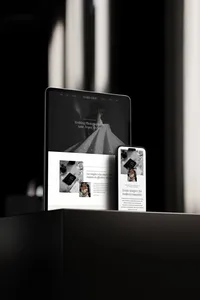 iPad and iPhone showing an editorial showit website template for photographers