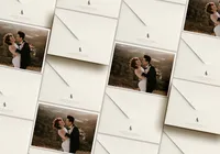 Envelope and card showing photography branding and a monogram logo design