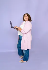 WishboneDesignStudio-Owner-HoldingLaptop