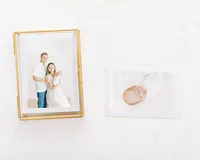 product photo of young family and newborn