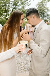 Unposed and candid moments of wedding guests enjoying the celebration, captured in a storytelling editorial style.