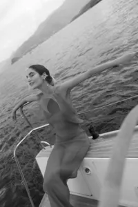 Bride enjoying private sail on Lake Como after elopement