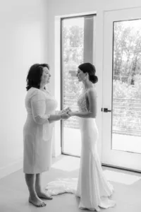 Morning moment of the mother of the bride and the bride black and white