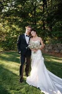 Bride and groom sharing an intimate portrait at sunset before their vineyard ceremony