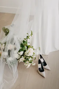 Blush and white garden rose bouquet with greenery at private estate wedding in Vancouver, Washington.