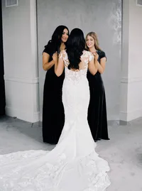 Bride sharing an emotional moment with her bridesmaid during wedding preparations before the Lake Oswego Oregon winery wedding.