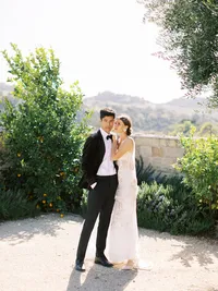 Close-up portrait of bride and groom sharing a quiet moment before ceremony at Sunstone Winery wedding.