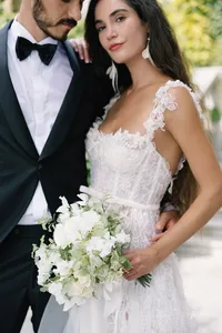 American couple portrait embracing on the terrace in Lake Como, Italy