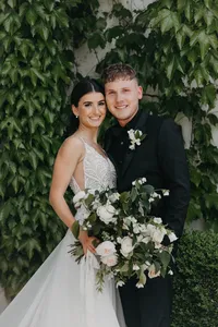 Bride and groom posing together at luxury private estate wedding in Vancouver, Washington.