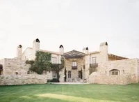 Aerial view of Sunstone Winery estate surrounded by vineyards in Santa Ynez Valley.