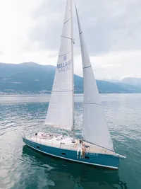 Sailboat on Lake Como captured during luxury destination editorial shoot