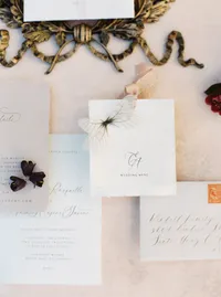 Wedding invitation suite with butterfly detail inspired by Sunstone Winery wedding design.
