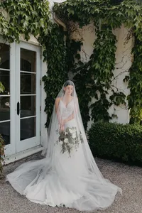 Bride with veil softly draped over her face at private estate wedding in Washington.