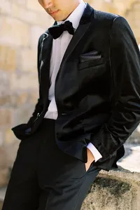 Close-up portrait of groom waiting for bride during Sunstone Winery wedding day.