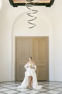 Bride waiting at a doorway just before the first look