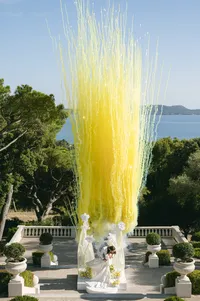 Yellow smoke celebration on a terrace overlooking the Mediterranean