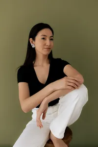 kaboompics_jewelry-brand-studio-photos-with-asian-model-on-green-background-41535